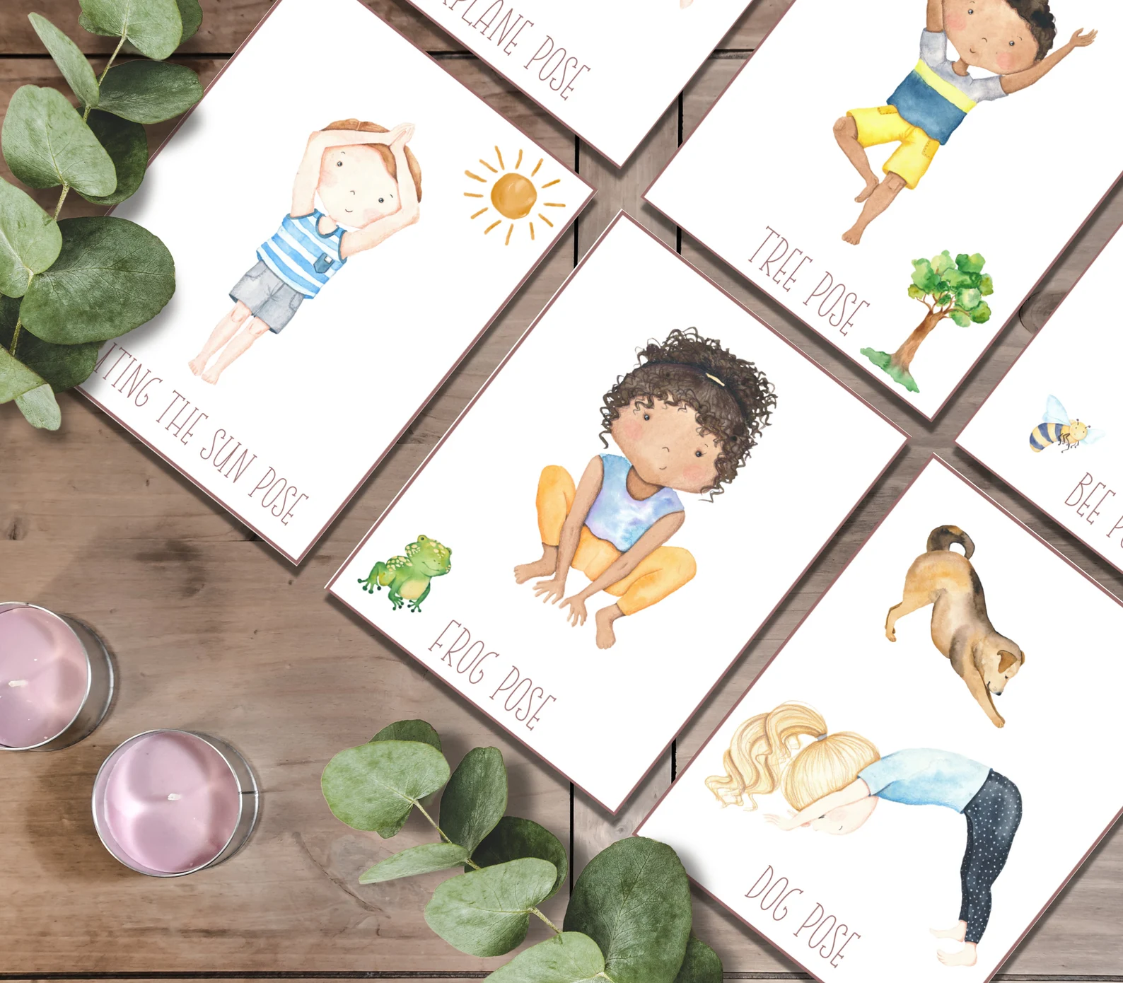 Yoga cards spread showing Tree Pose, Frog Pose, and Dog Pose